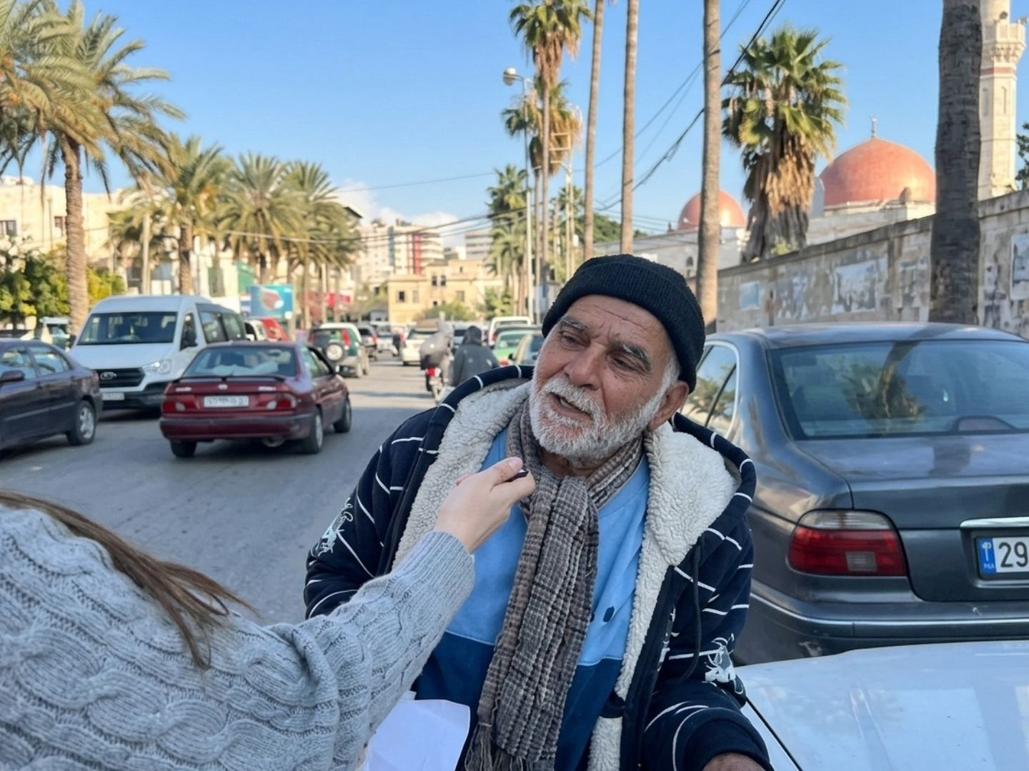 Rikaz providing financial assistance to drivers in Sidon, Lebanon